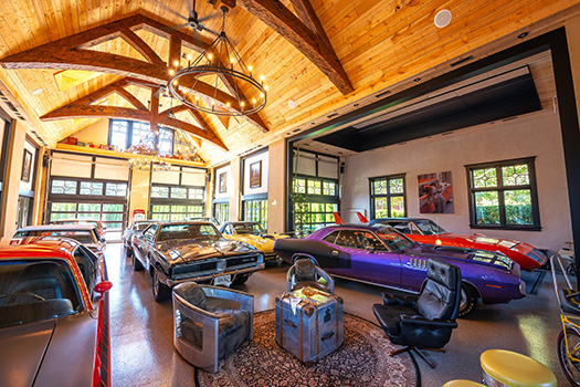 garage interior highlighting many cars and sitting area